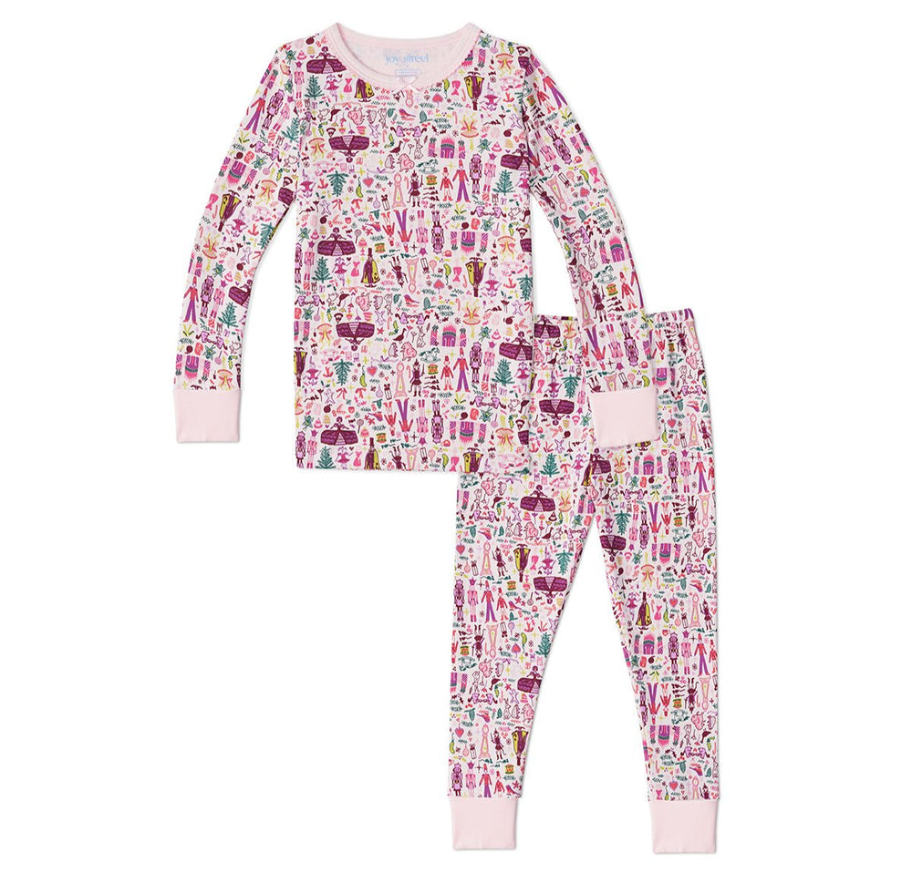 Flat lay of Nutcracker two-piece kids pajamas showcasing all-over pink nutcracker print with ribbed cuffs on white background