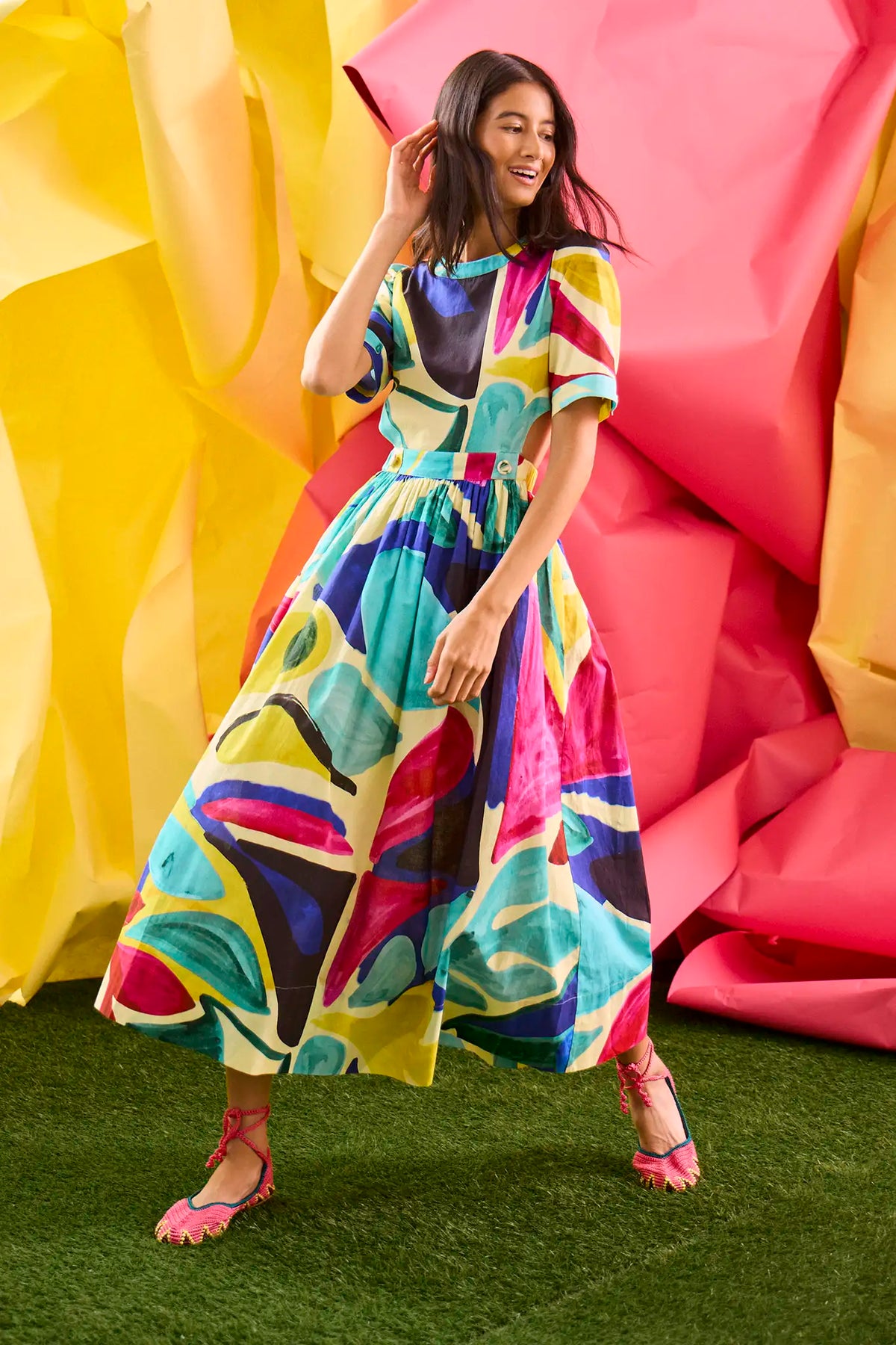 Midi dress in colorful print including pink, green, pink and black with side bodice cut-outs