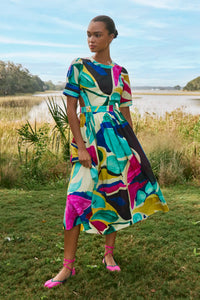 Midi dress in colorful print including pink, green, pink and black with side bodice cut-outs