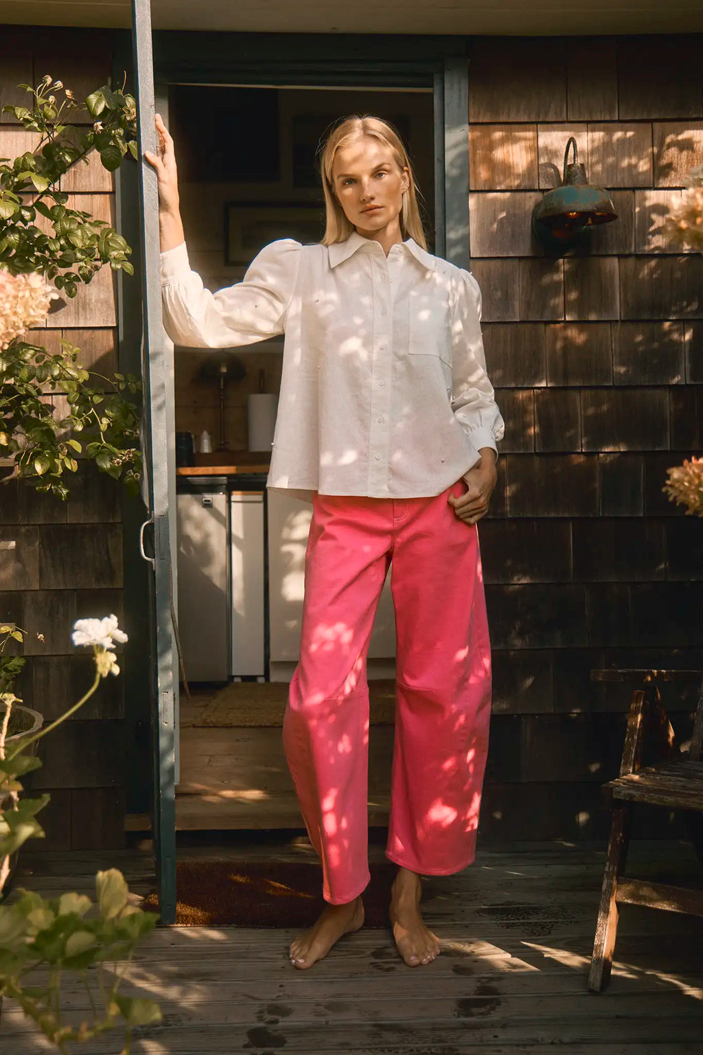 Peony stretch denim barrel leg jeans with five-pocket styling.