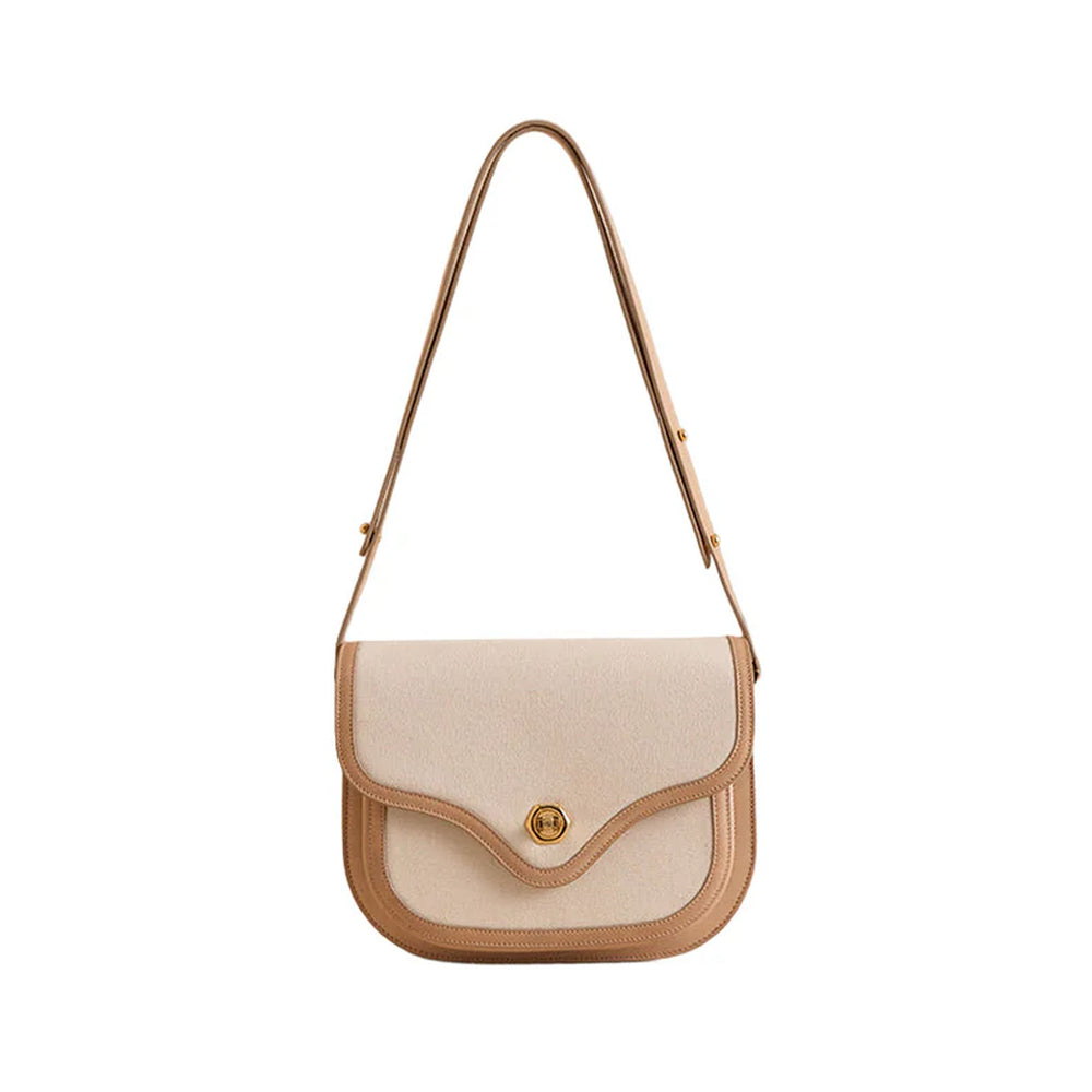 Front view of Jane shoulder bag in canvas natural with tan leather trim and gold turn-lock closure on white background
