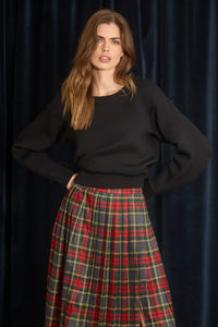 The Jennie Sweatshirt is a structured scuba in deep Onyx with pleated long sleeves.