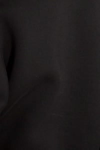 Duvall Pant is a five-pocket jean and holds a barrel-leg shape with a front fly, zipper and button.