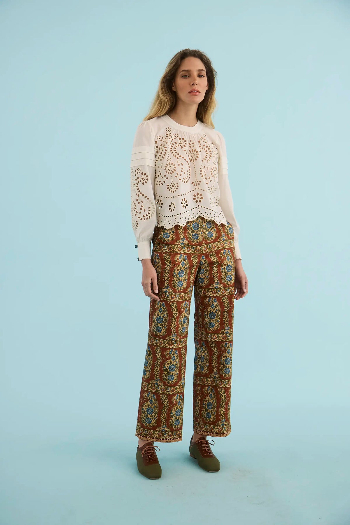 The Jennifer Top in ivory paired with the Juno Pant in Amber Glen Brown. 