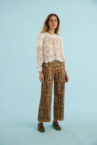 The Jennifer Top in ivory paired with the Juno Pant in Amber Glen Brown. 