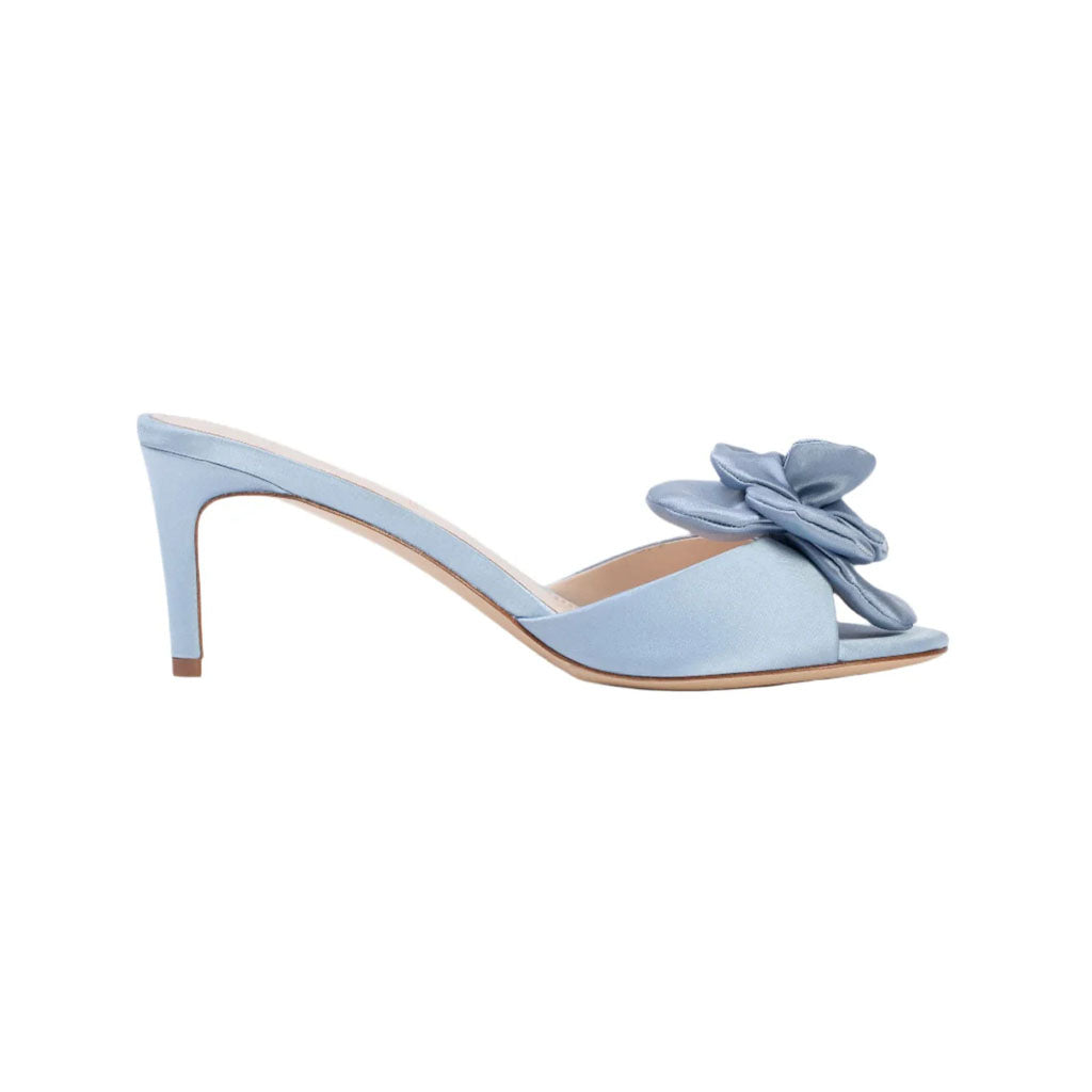 Side view of Josey 65 in Blue Fog Satin mule showcasing satin rosette and 2.5-inch kitten heel with white background