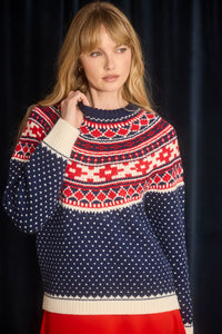 The Josie Sweater in St. Moritz Fair Isle has a ribbed crew neckline and long raglan sleeves.
