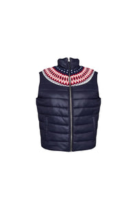 The Brady Vest is a elevated puffer with a collared neckline and a knitted Fair Isle yoke.