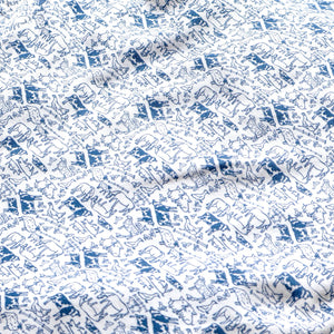 Close-up of Farm Kids Henley Pajamas, Set of 2 showcasing blue farm-themed print on white fabric