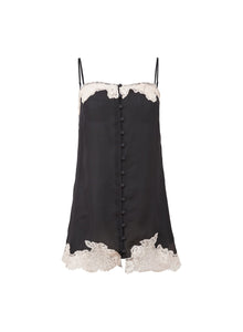 Black slip dress with white lace trim