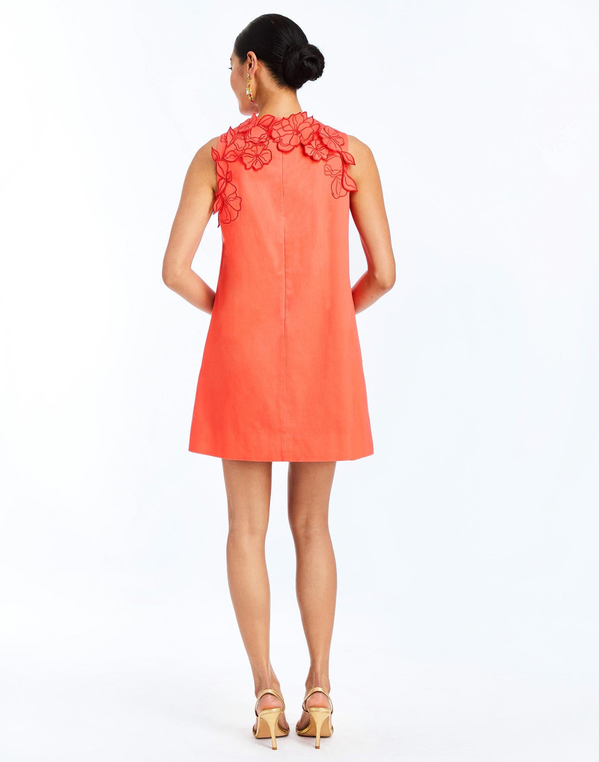 Back - Juniper Shift Mini Dress in Calypso Coral is an embroidered shift mini with scalloped floral appliqué and crew neckline.