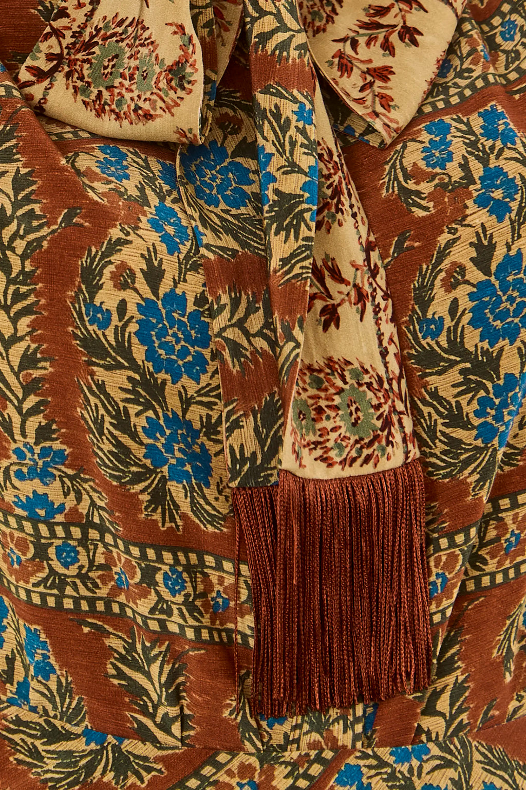 Close up of the Karis Blouse in Amber Glen Brown. 