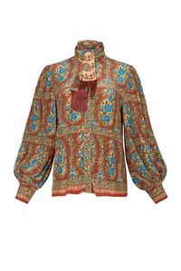 The Karis Blouse in Amber Glen Brown. 