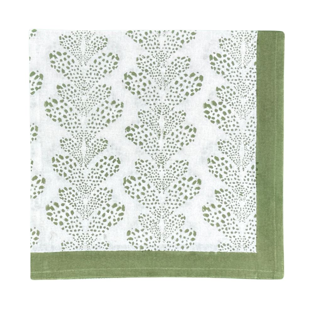 Front view of The Kelli Napkin in Sage showcasing a sage border and dotted botanical pattern on a white background