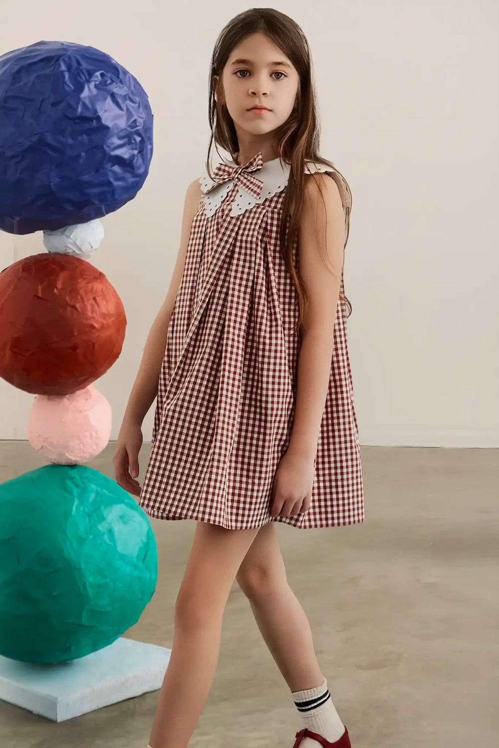 The Kids Marianne Dress in Cotswold Check Rust. 