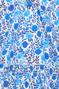 Close up of the Kids Merritt Dress in Bermuda Blooms.