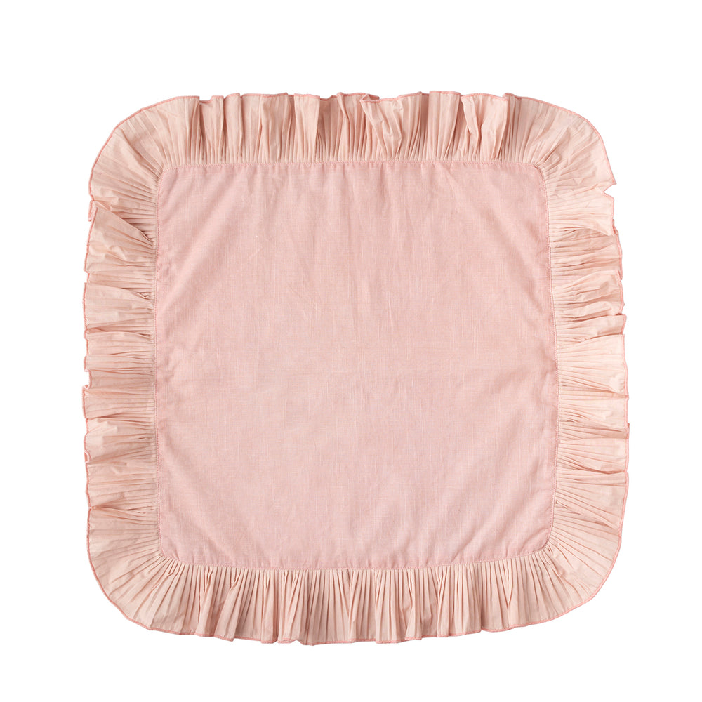 Top view of Mademoiselle napkin in petal pink showcasing knife-pleated ruffle border on white background