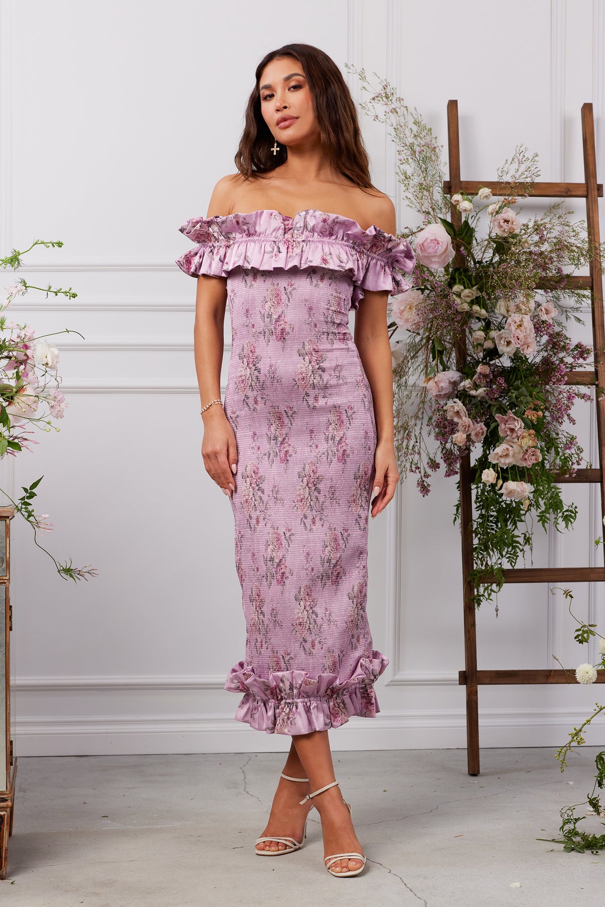 Front view of The Lilac Dress in Lilac Tapestry Rose showing off-the-shoulder neckline and ruffled hem on a model