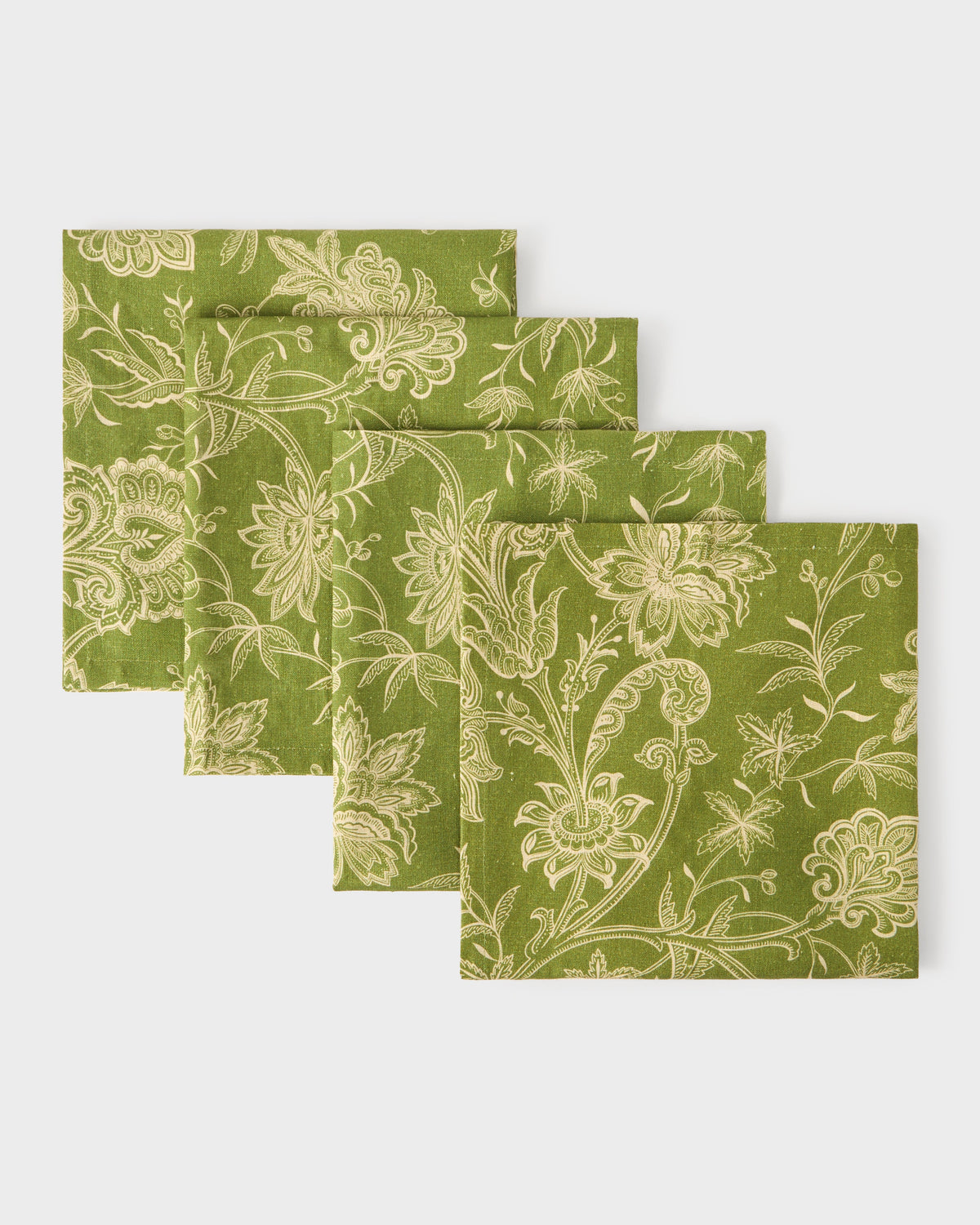 Top view of DESTREE x Cabana Napkins in Green, Set of 4 showcasing a refined floral motif with a white background