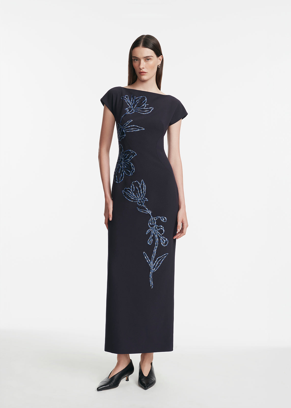 Front view of Ikat Floral Embroidered Fluid Crepe Dress in Navy and Blue with blue floral embroidery and bateau neckline