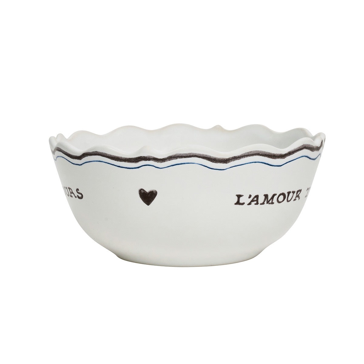 Front view of L’Amour Toujours cereal bowl with scalloped rim and black-and-blue heart and script motif on white background