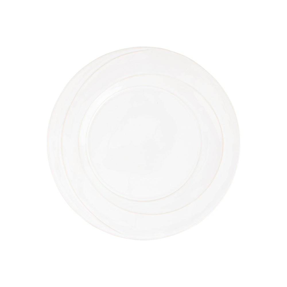 Top view of Luna Salad Plate showing subtle concentric moonlike ridges on white stoneware with plain white background