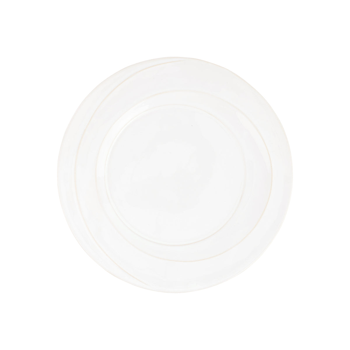 Top view of Luna Salad Plate showing subtle concentric moonlike ridges on white stoneware with plain white background
