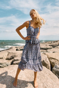 Vine Stripe peplum midi dress with a sleeveless bodice, sweetheart neckline, full circle skirt.