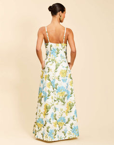 Ladera Gown in Verdant Blooms poly silk twill with straight neckline, mini bow straps, A-line silhouette, and side pockets.