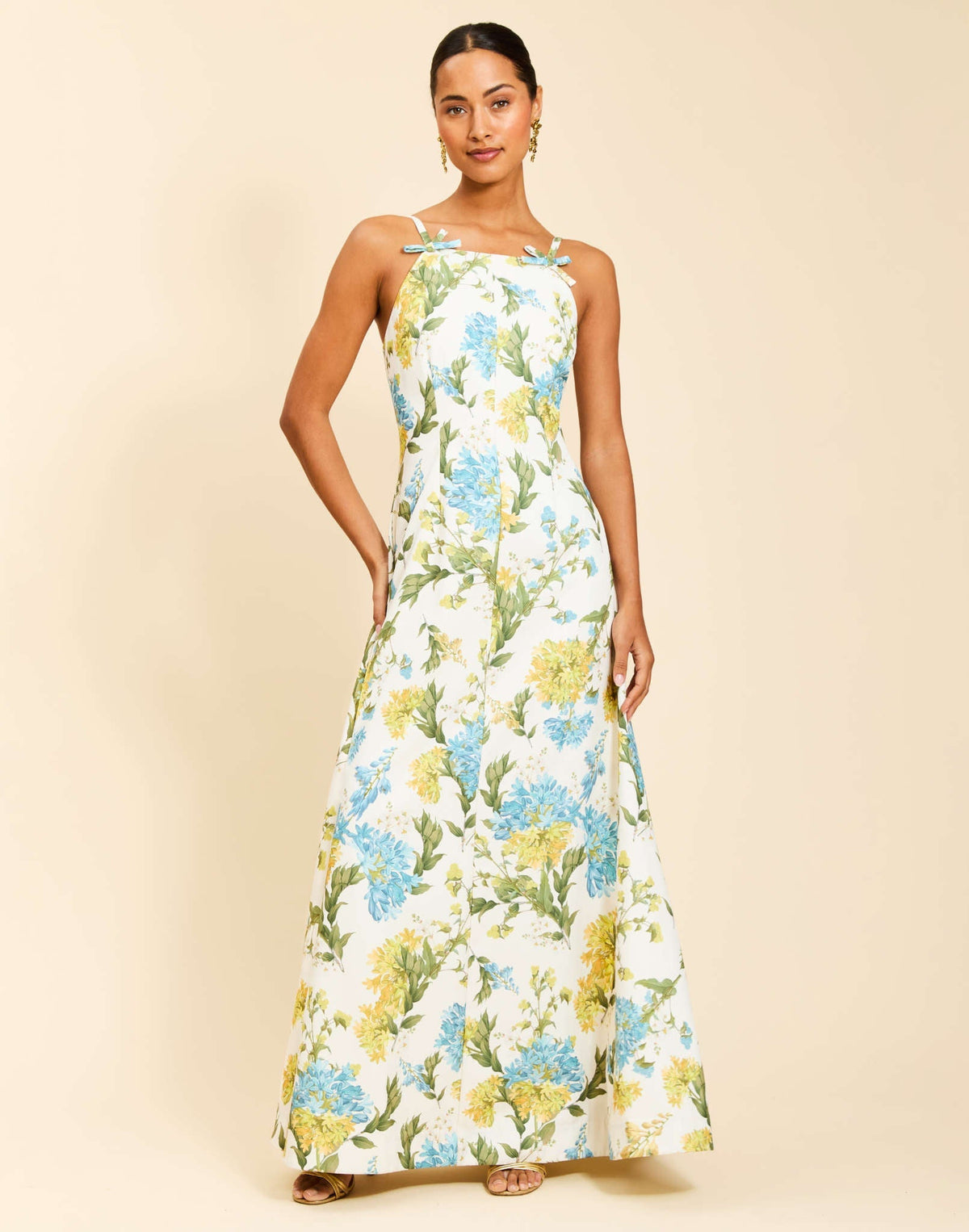 Ladera Gown in Verdant Blooms poly silk twill with straight neckline, mini bow straps, A-line silhouette, and side pockets.
