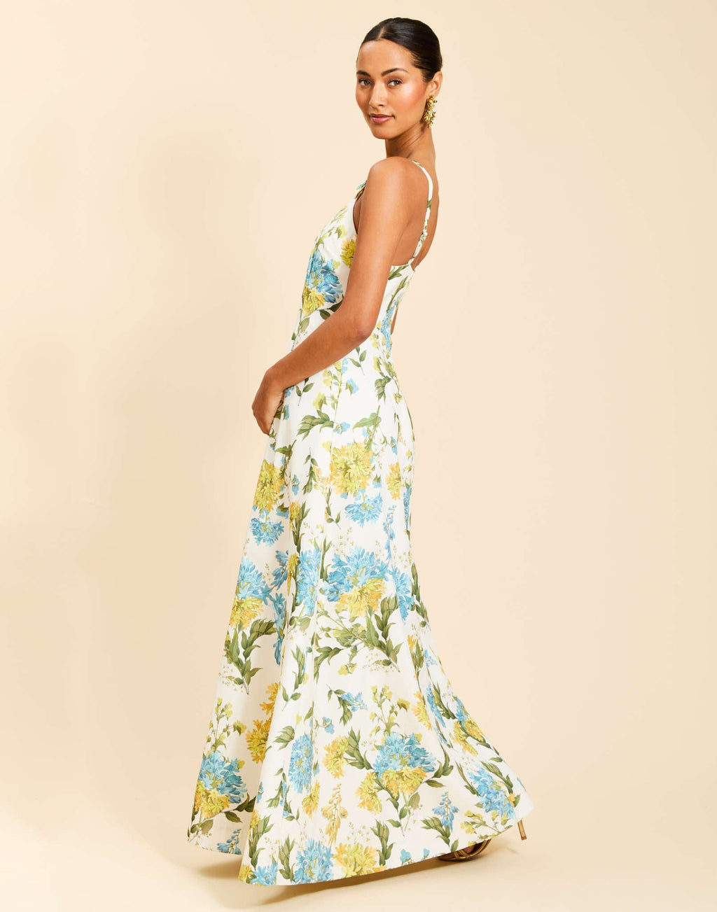 Ladera Gown in Verdant Blooms poly silk twill with straight neckline, mini bow straps, A-line silhouette, and side pockets.