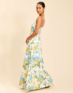 Ladera Gown in Verdant Blooms poly silk twill with straight neckline, mini bow straps, A-line silhouette, and side pockets.