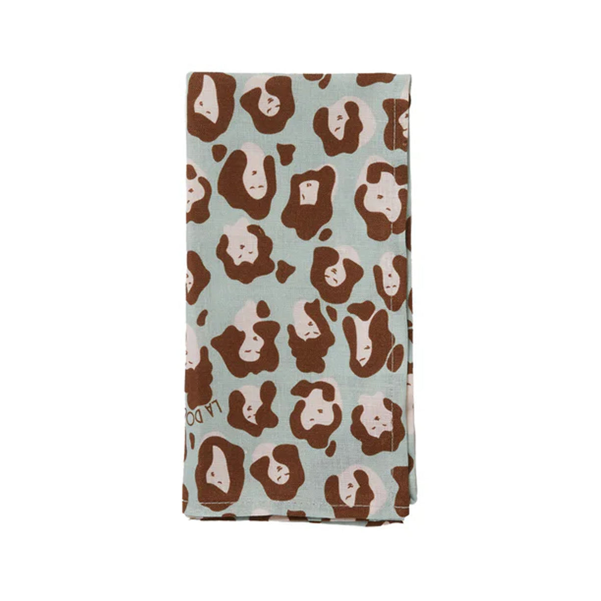 Folded view of Large Napkins in Lady Leopard Acquamarina, Set of 2 with brown and cream leopard faces on light blue linen, white background