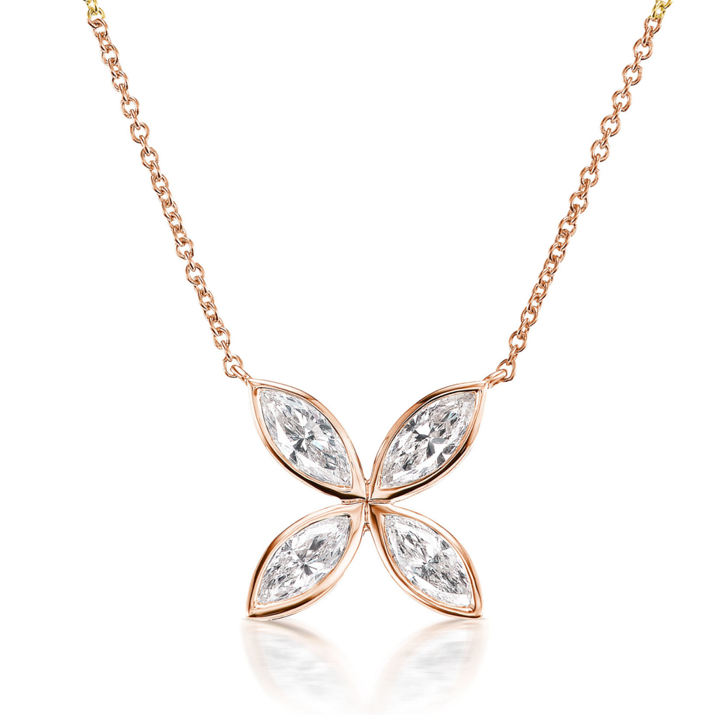 The Bezel Set Marquise Diamond Floral Pendant features a four-petal flower design with marquise-cut diamonds totaling 1.23TCW, set in 18k gold on an elegant 18-inch chain.