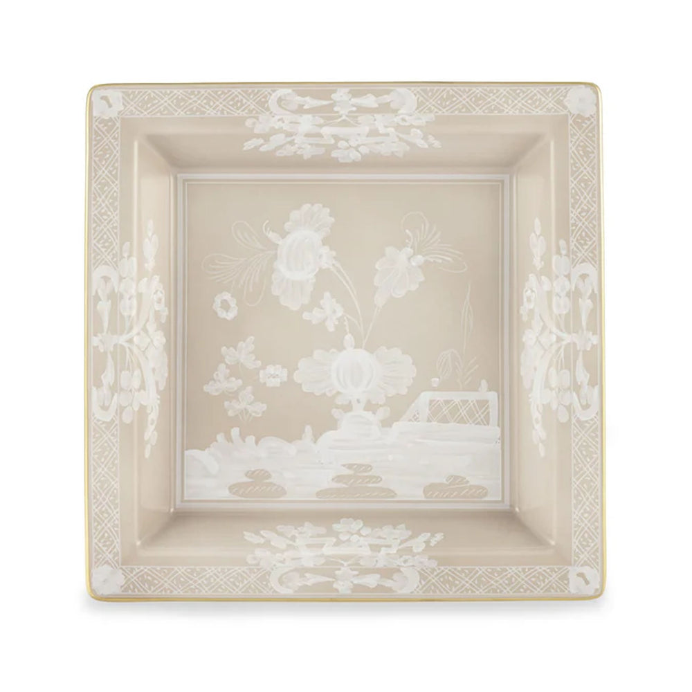 Front view of Oriente Italiano Oggetti Change Tray in Meringa with floral decoration and gold rim