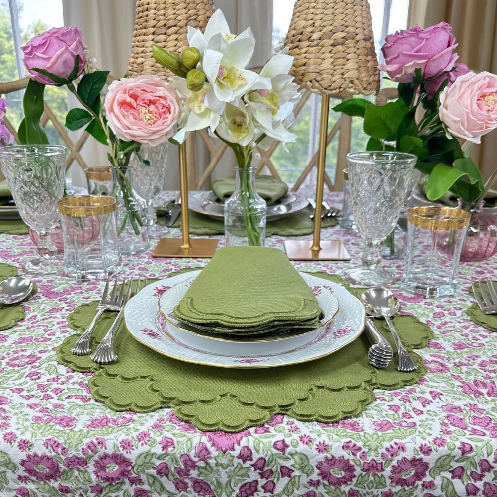 Elegant table setting with floral centerpieces, sage napkins, and a floral hand block printed tablecloth. luxury placemat 