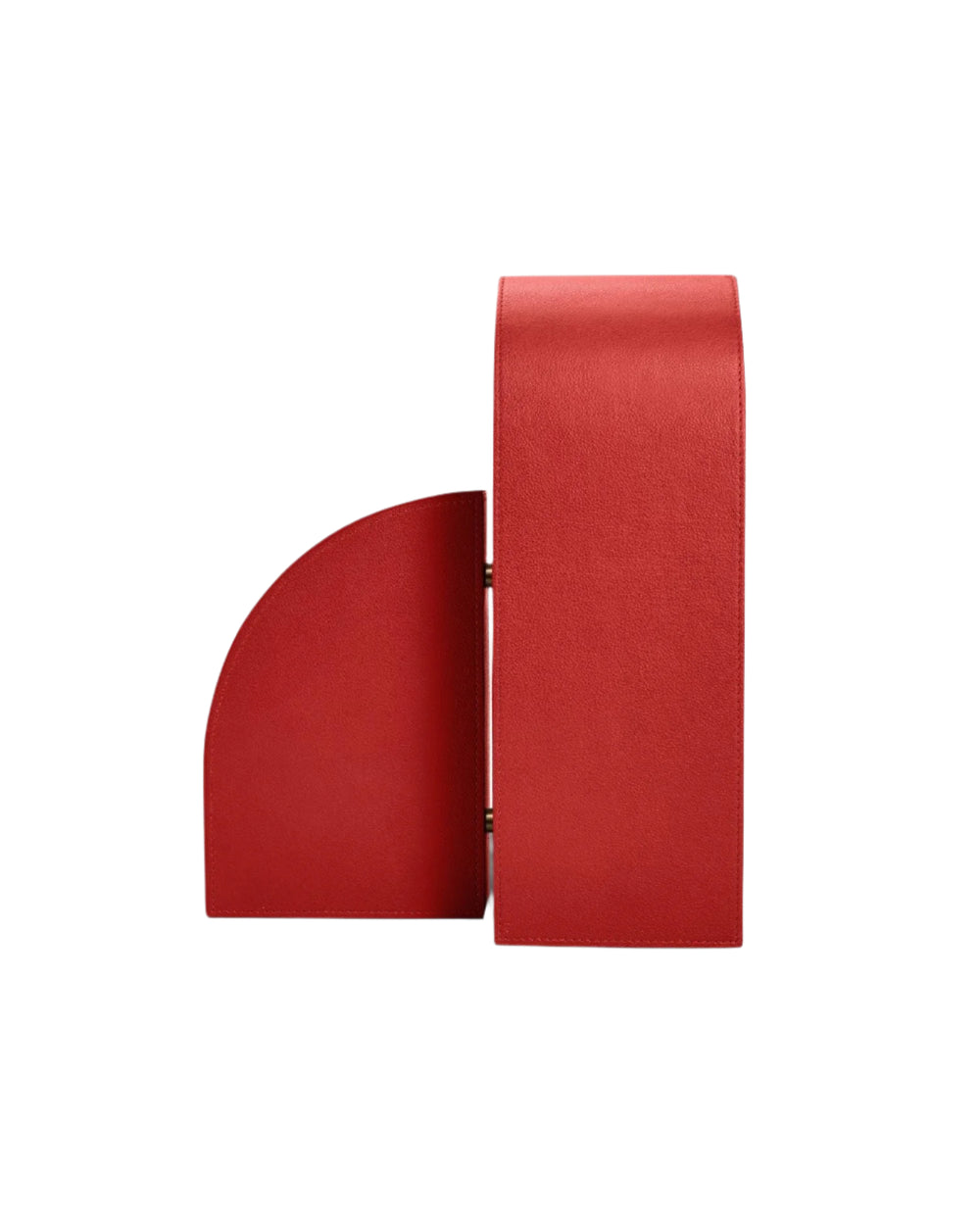 Front view of Left Cubist Bookend in red showcasing pebbled leather and brass hinge on white background