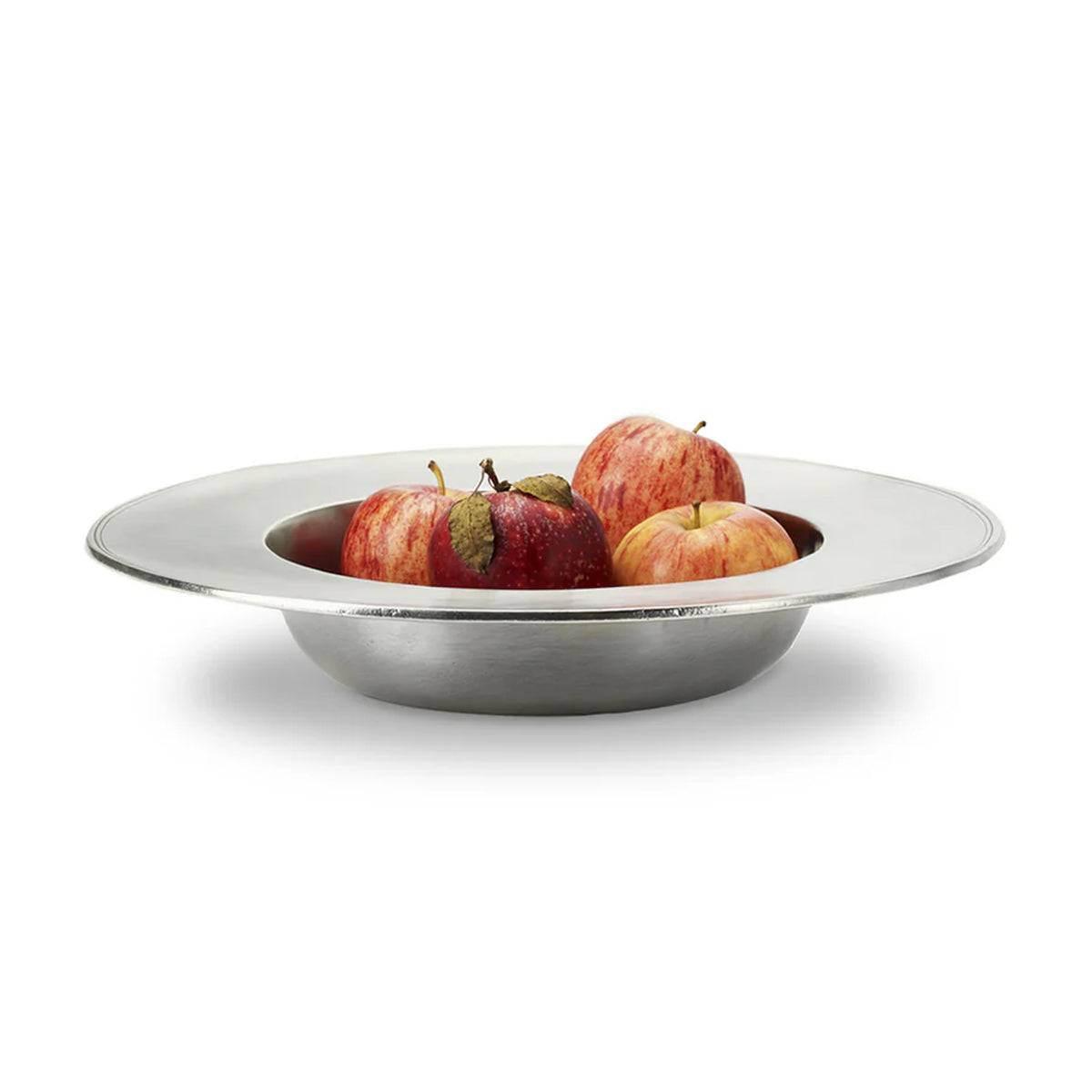 Front view of Leonardo Bowl, Large showcasing its wide rim and pewter finish with apples on a white background