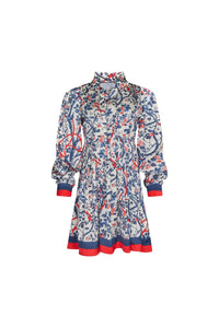 The Lila Dress is a mini with a tie neckline, long sleeves with button cuffs and a color block hem. 