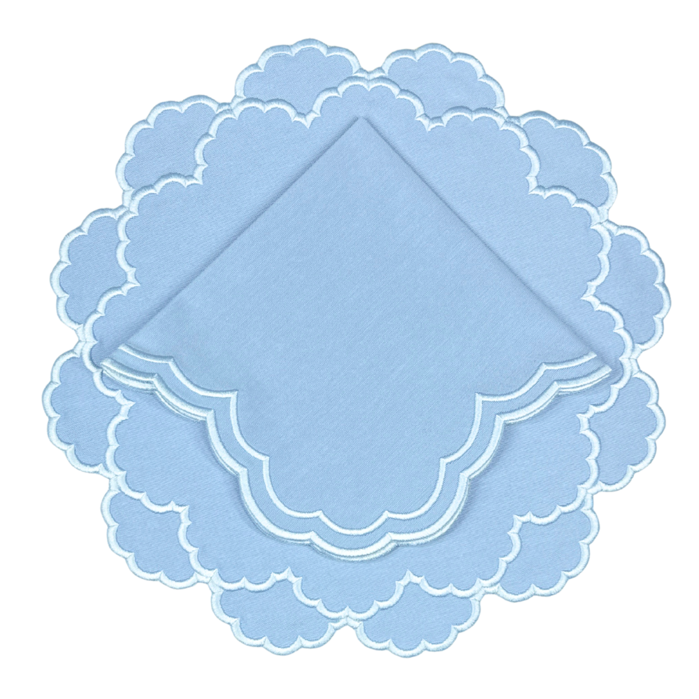 Light blue scalloped luxury embroidered placemat  and napkin with light blue embroidery