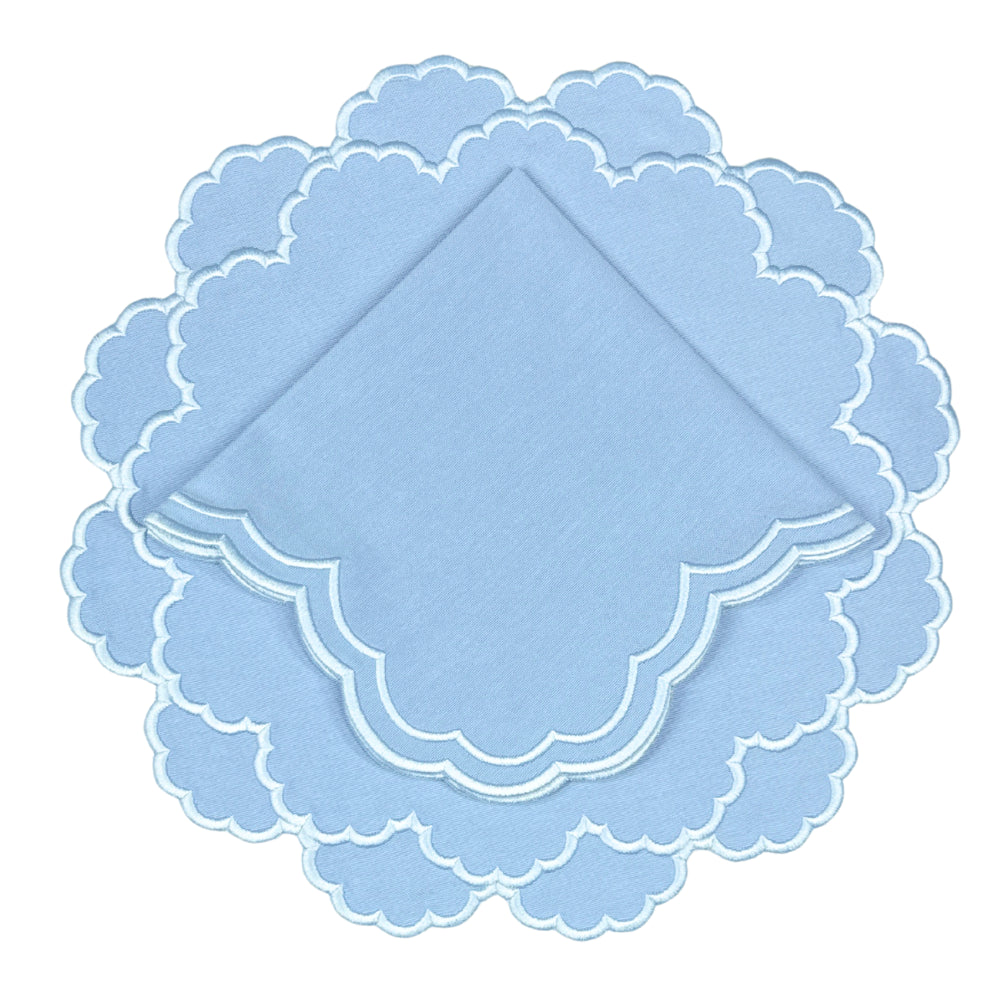 Light blue scalloped luxury embroidered placemat  and napkin with light blue embroidery