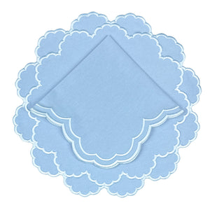 Light blue scalloped luxury embroidered placemat  and napkin with light blue embroidery