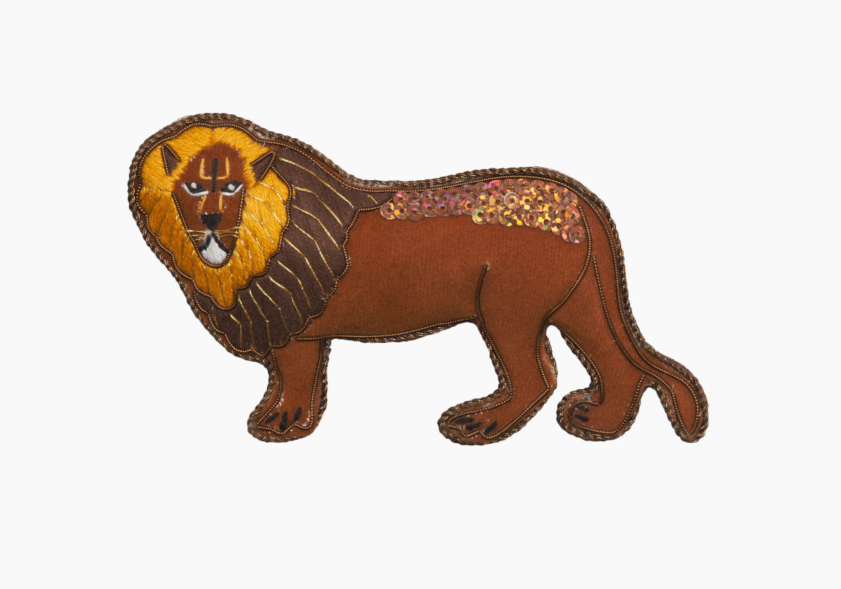 Front view of Lion Ornament showcasing beaded and metallic thread embroidery on velveteen with a white background