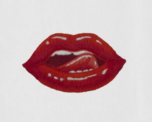 Image of a Henry Handwork Lips motif.