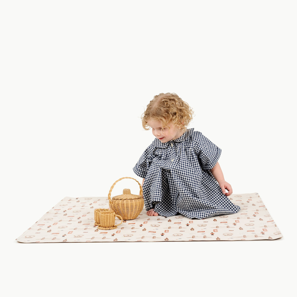 London@kid playing on the london mini mat