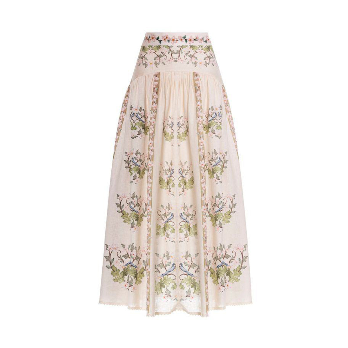 Front view of Curua Anhelo linen maxi skirt with hand-embroidered floral panels, high waistband and high-low hem on white