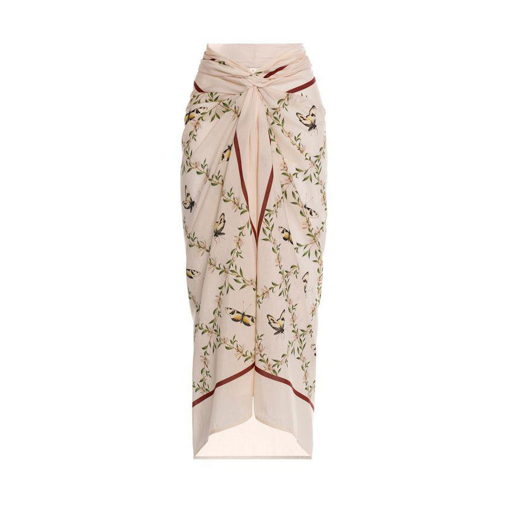 Front view of Lavanda Azucar pareo showcasing knot-tie waist, midi length and butterfly and vine print on pale lavender background