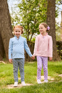 Little English traditional children's clothing.  Long sleeve Hastings polo in light pink with ruffle collar and purple floral detailing. Paired with Purple floral leggings for little girls.  Light blue Hastings polo with green floral detail paired with green floral leggings.