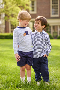Little English traditional children's clothing.  Light blue and navy Winslow Stripe long sleeve polo shirt paired with navy essential jogger.  Light blue stripe long sleeve applique t-shirt with football and helmet applique paired with navy twill basic shorts.