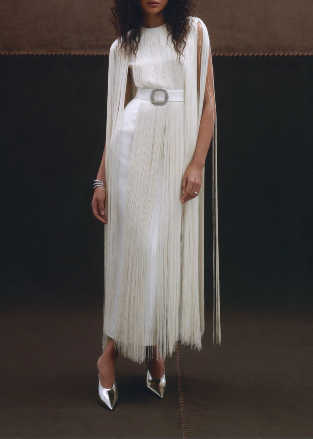 Front view of the Constance Fringe Dress in white, showcasing French silky fringe and antique silver belt buckle